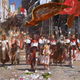 Destiny 2 concept art that shows people parading down the streets of the Last City.